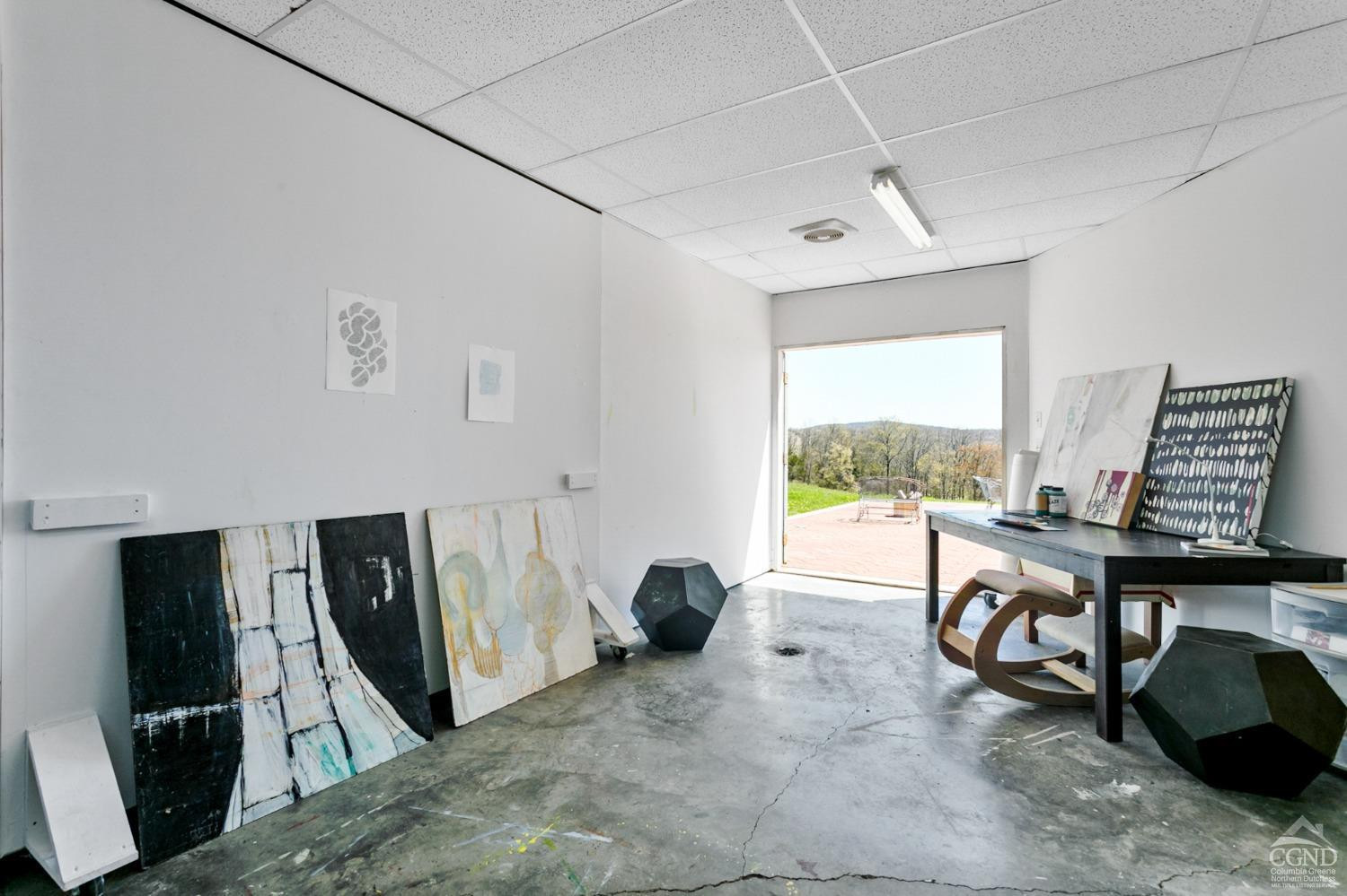 742 Embought Road Catskill, NY 12414 - Photo 23 of 32 a view of a livingroom with workspace and a window