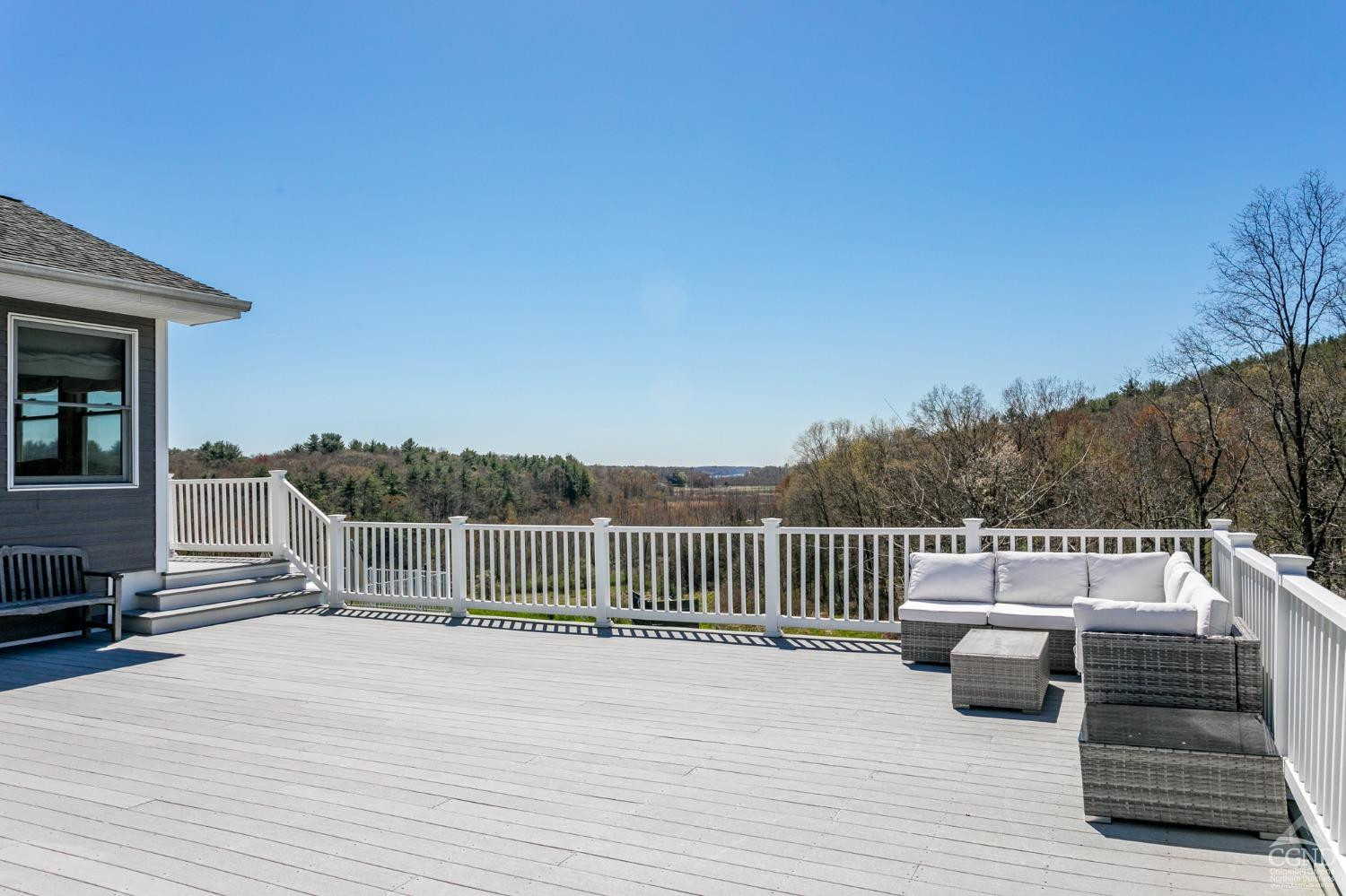 742 Embought Road Catskill, NY 12414 - Photo 27 of 32 a view of terrace with wooden floor and outdoor seating