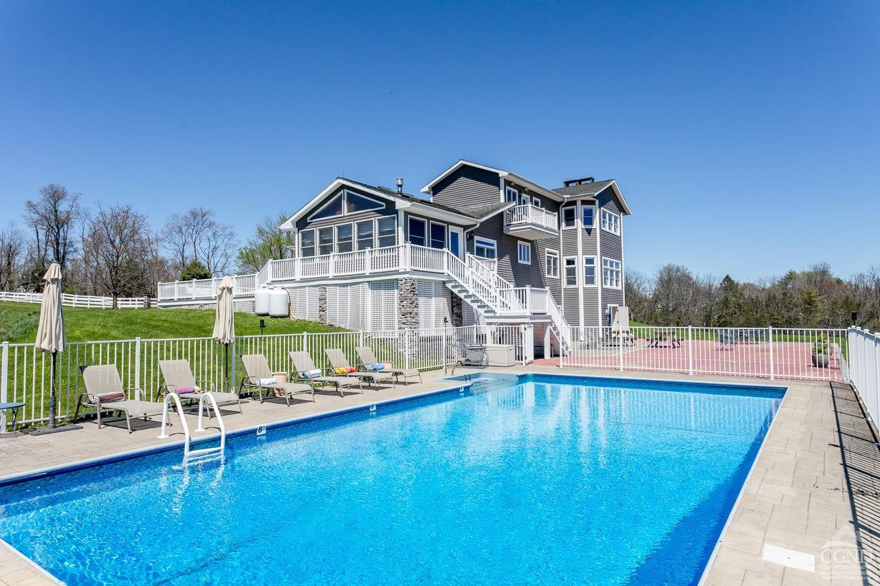 742 Embought Road Catskill, NY 12414 - Photo 3 of 32 a front view of a house with swimming pool having outdoor seating