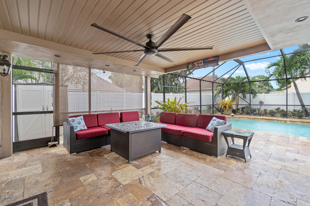 22313 Ensenada Way Boca Raton, FL 33433 - Photo 15 of 44 a living room with patio furniture and a potted plant