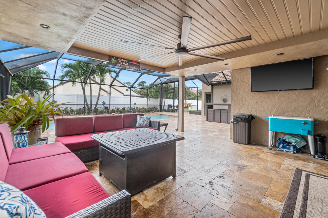 22313 Ensenada Way Boca Raton, FL 33433 - Photo 16 of 44 a view of a backyard with a patio