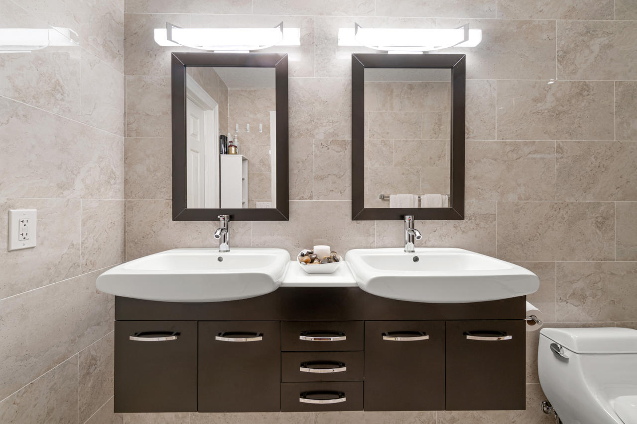 22313 Ensenada Way Boca Raton, FL 33433 - Photo 31 of 44 a bathroom with double sink and two mirror