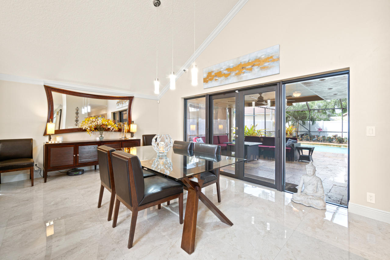 22313 Ensenada Way Boca Raton, FL 33433 - Photo 9 of 44 a workspace with furniture
