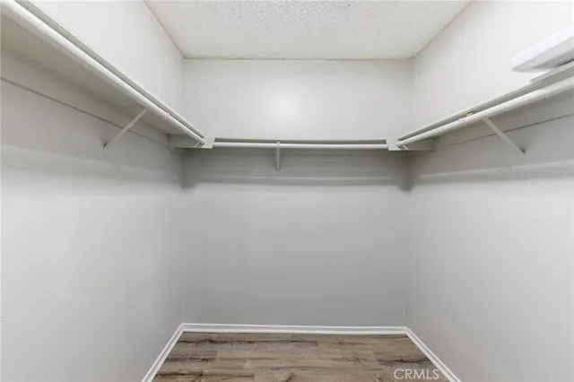 a house with potted plants in front of door