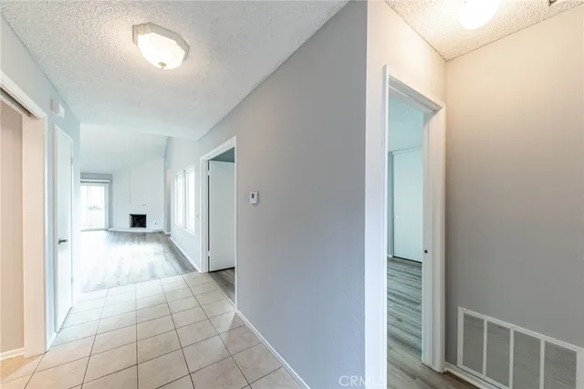 a kitchen with stainless steel appliances a stove and a refrigerator