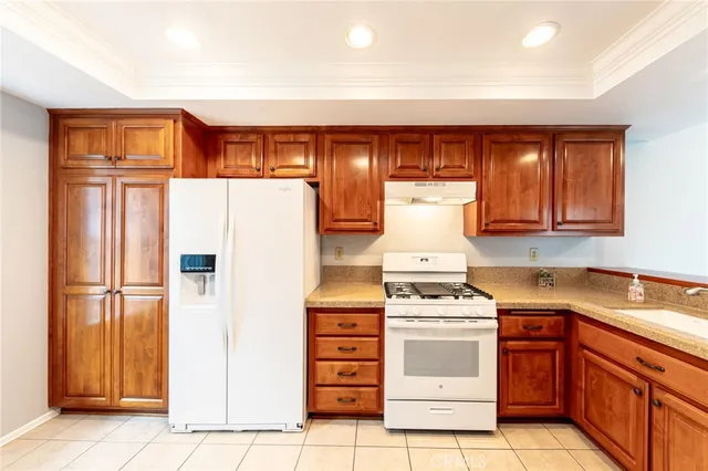 a kitchen with a stove and a sink