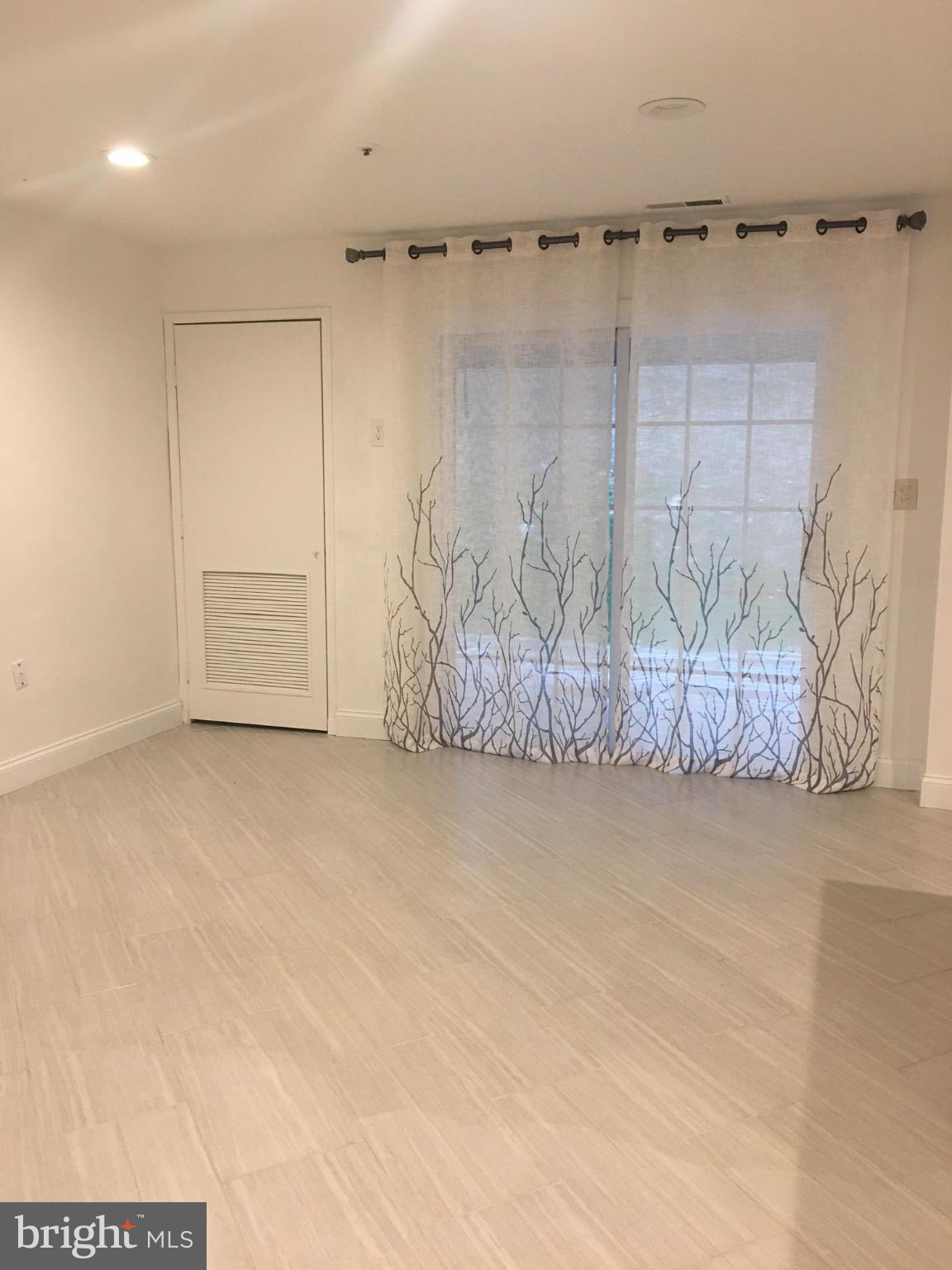 8390 Montgomery Run Road, Unit B Ellicott City, MD 21043 - Photo 16 of 30 Living Room