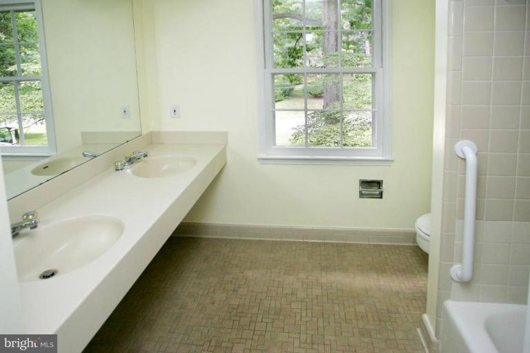 7912 Greentree Road Bethesda, MD 20817 - Photo 17 of 23 a bathroom with a sink and a bathtub