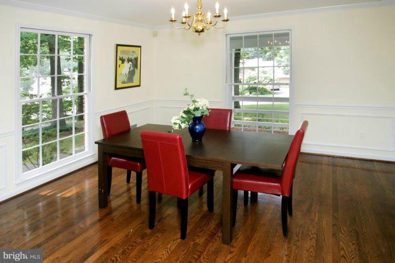 7912 Greentree Road Bethesda, MD 20817 - Photo 4 of 23 a view of a dining room with furniture and window