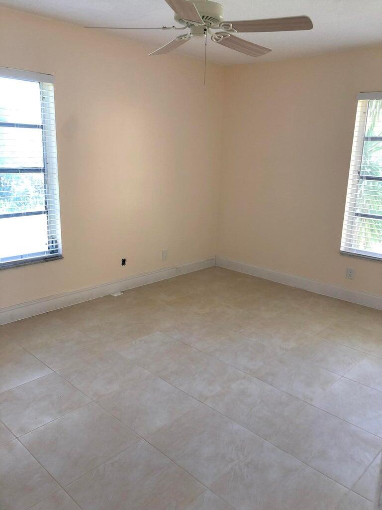 450 Northwest 20th Street, Unit 202 Boca Raton, FL 33431 - Photo 4 of 10 Master Bedroom