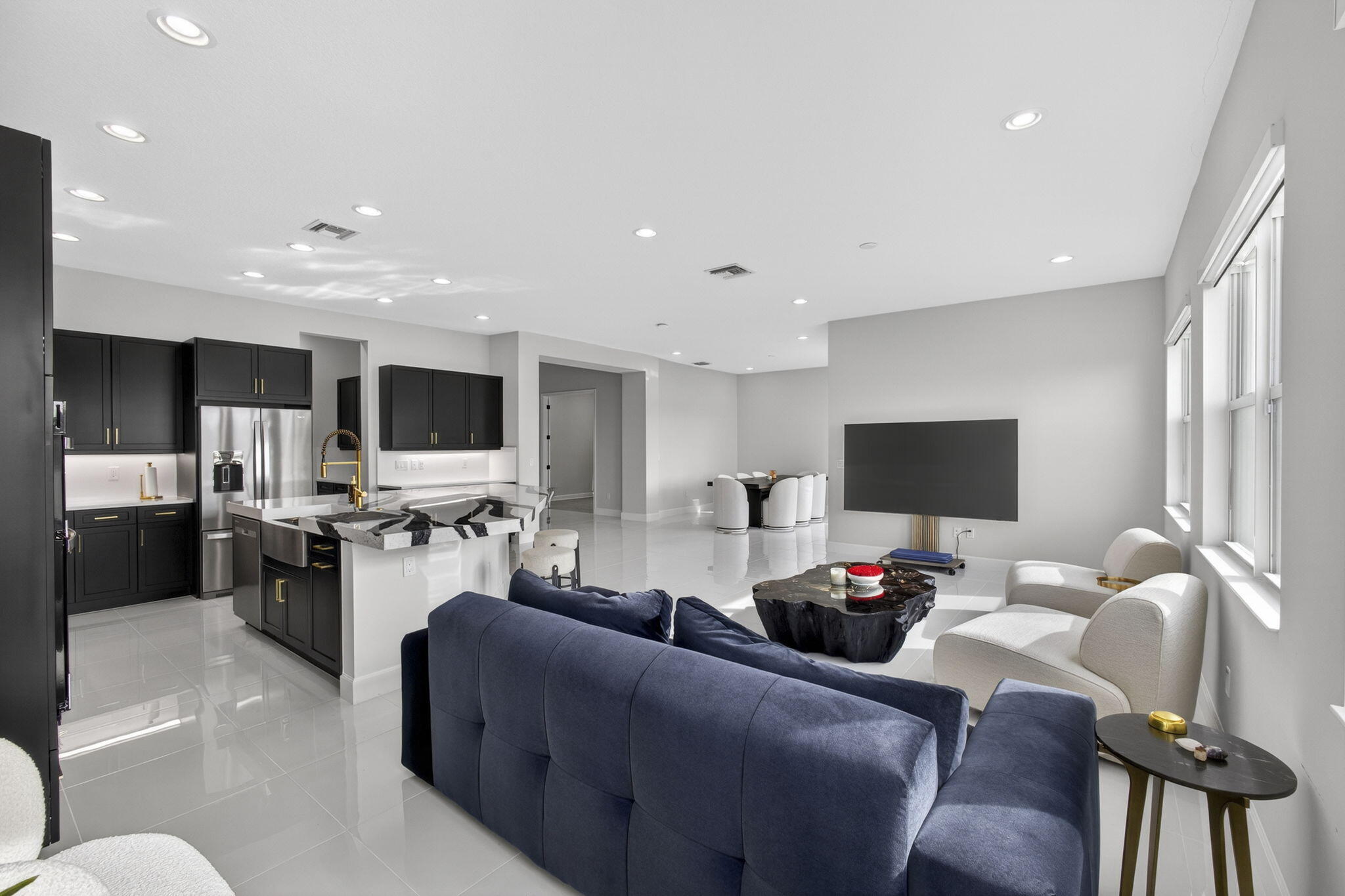 14052 Spruce Pne Drive Loxahatchee, FL 33470 - Photo 12 of 59 a living room with furniture and a flat screen tv