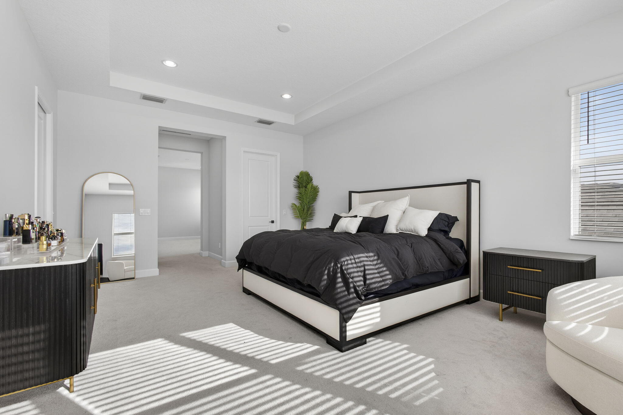 14052 Spruce Pne Drive Loxahatchee, FL 33470 - Photo 21 of 59 a bedroom with a bed and a dresser