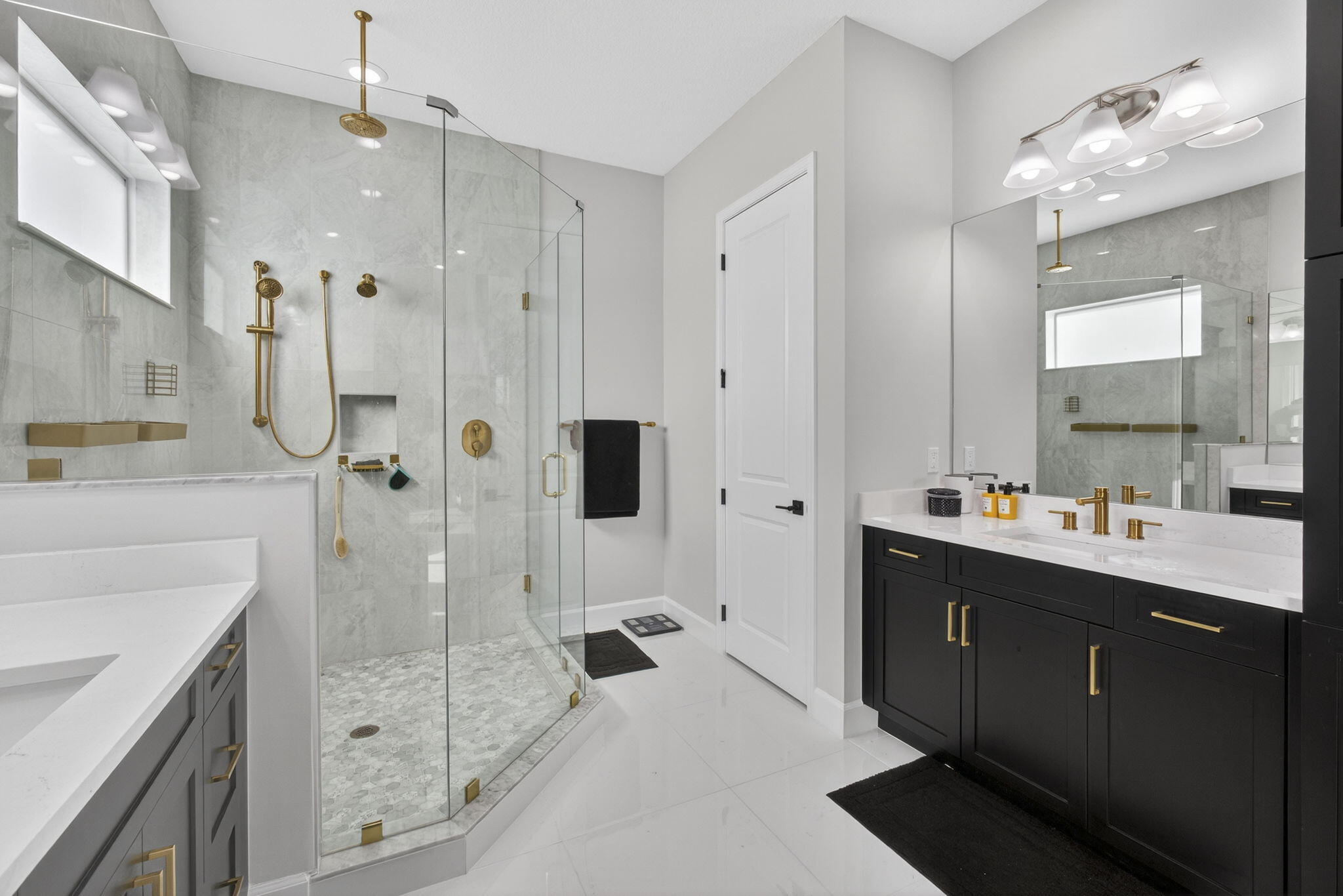 14052 Spruce Pne Drive Loxahatchee, FL 33470 - Photo 24 of 59 a spacious bathroom with a shower sink mirror and