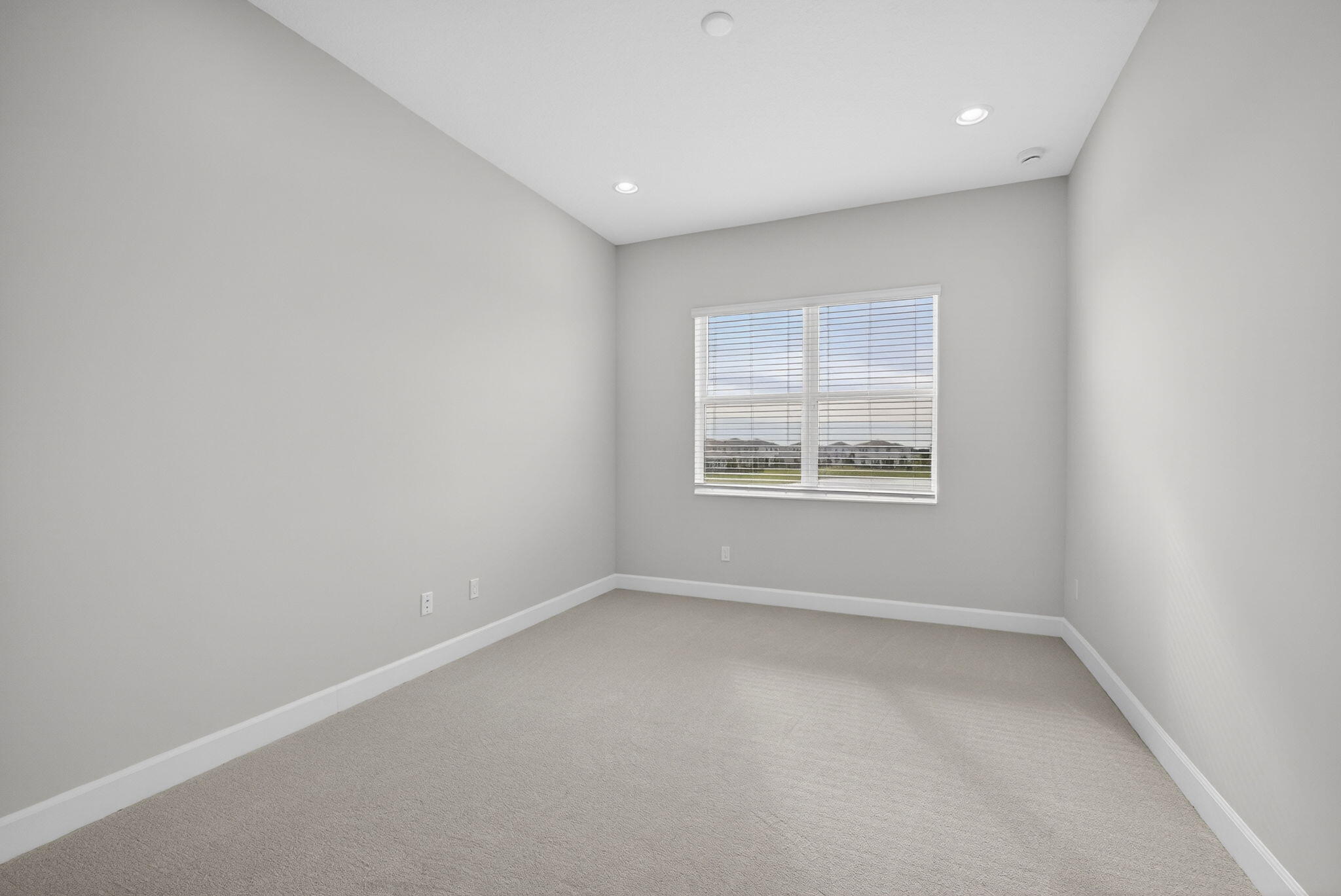 14052 Spruce Pne Drive Loxahatchee, FL 33470 - Photo 28 of 59 an empty room with windows