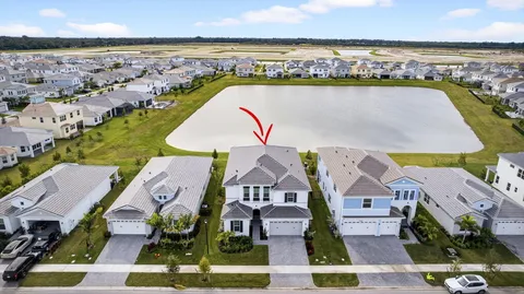 an aerial view of a house with a outdoor space