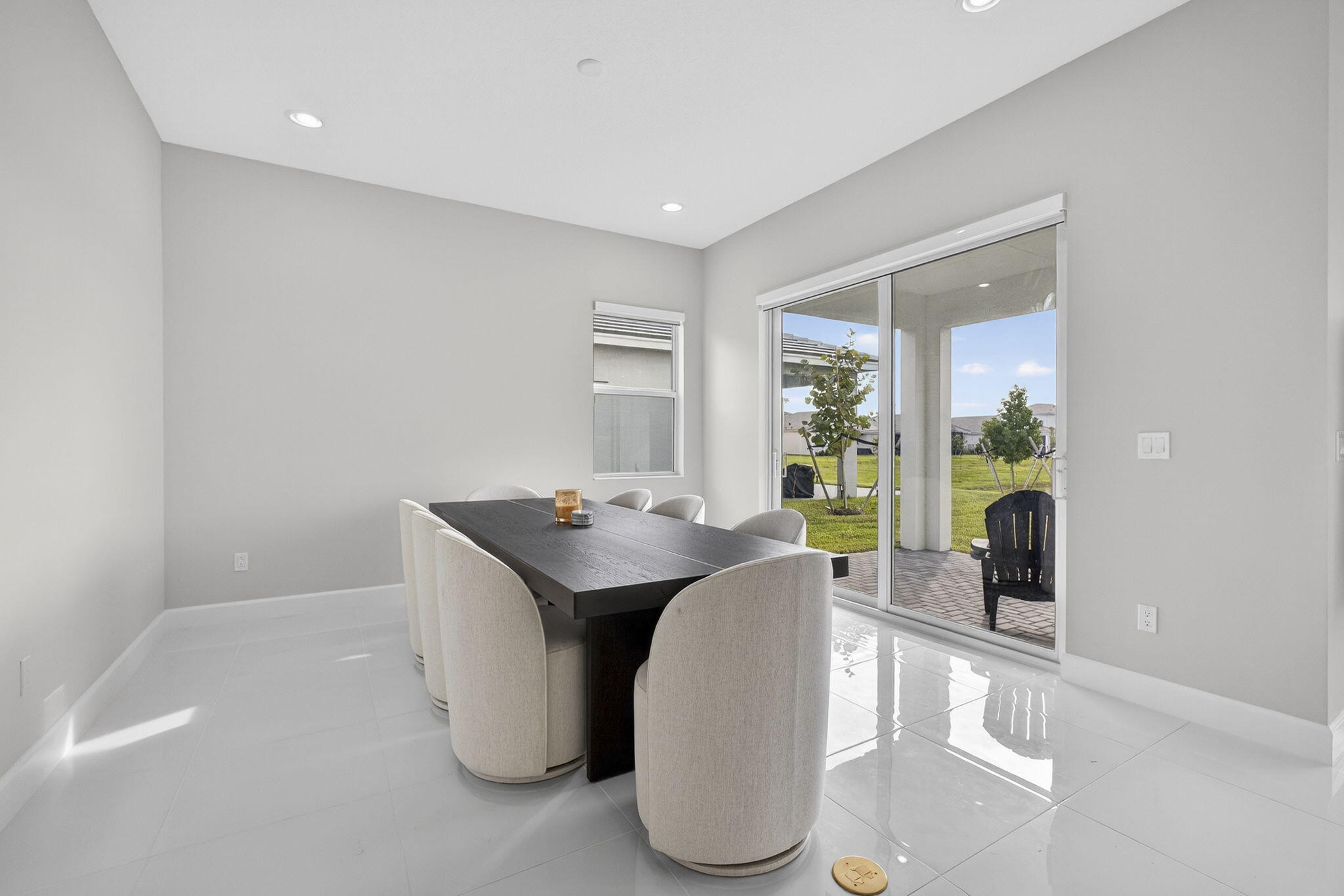 14052 Spruce Pne Drive Loxahatchee, FL 33470 - Photo 9 of 59 a dining room with furniture and wooden floor