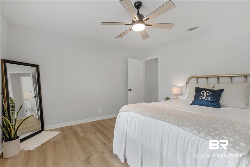 1624 Apex Drive Mobile, AL 36693 - Photo 20 of 29 Bedroom with ceiling fan and light hardwood / wood-style flooring