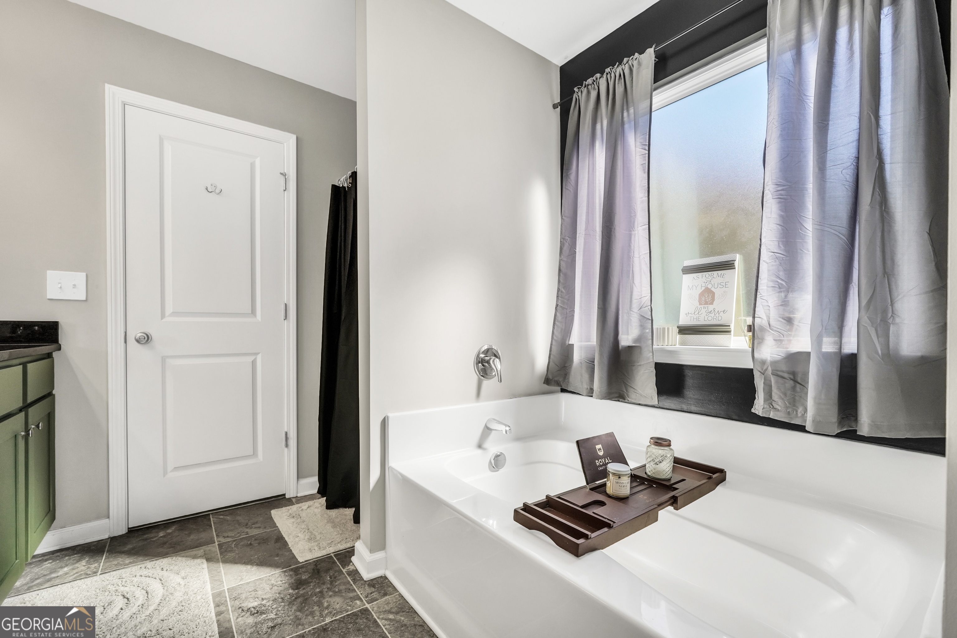 129 Magnolia Trail Milner, GA 30257 - Photo 18 of 29 a living room with furniture and large windows