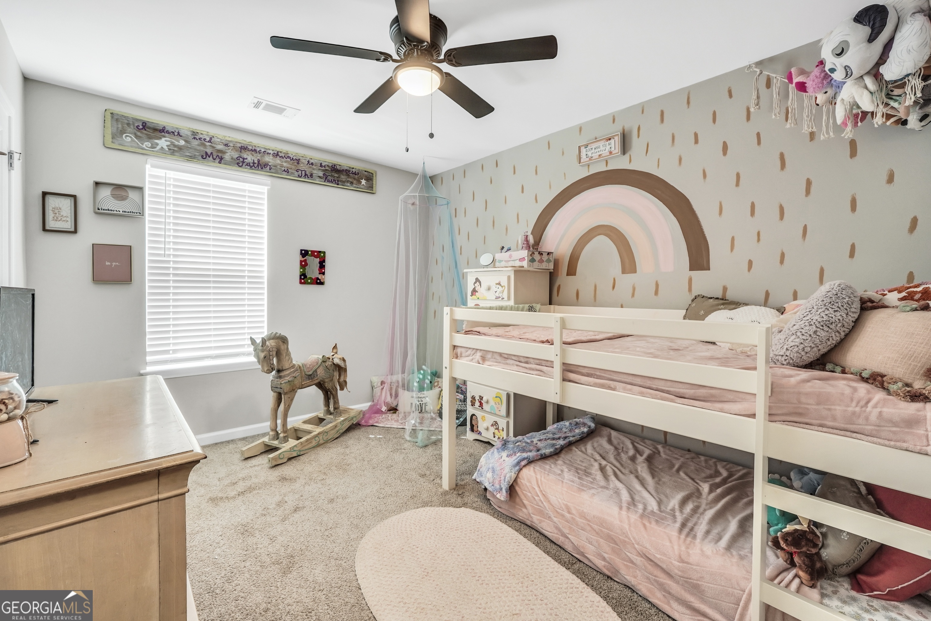 129 Magnolia Trail Milner, GA 30257 - Photo 21 of 29 a living room with furniture and a window