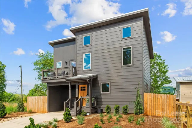 a front view of a house with yard