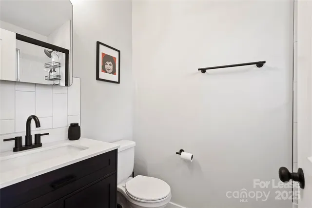 a bathroom with a sink and a toilet