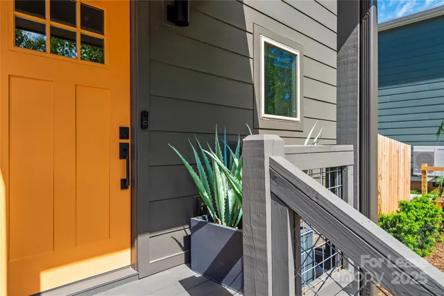 a two chairs sitting in front of a door