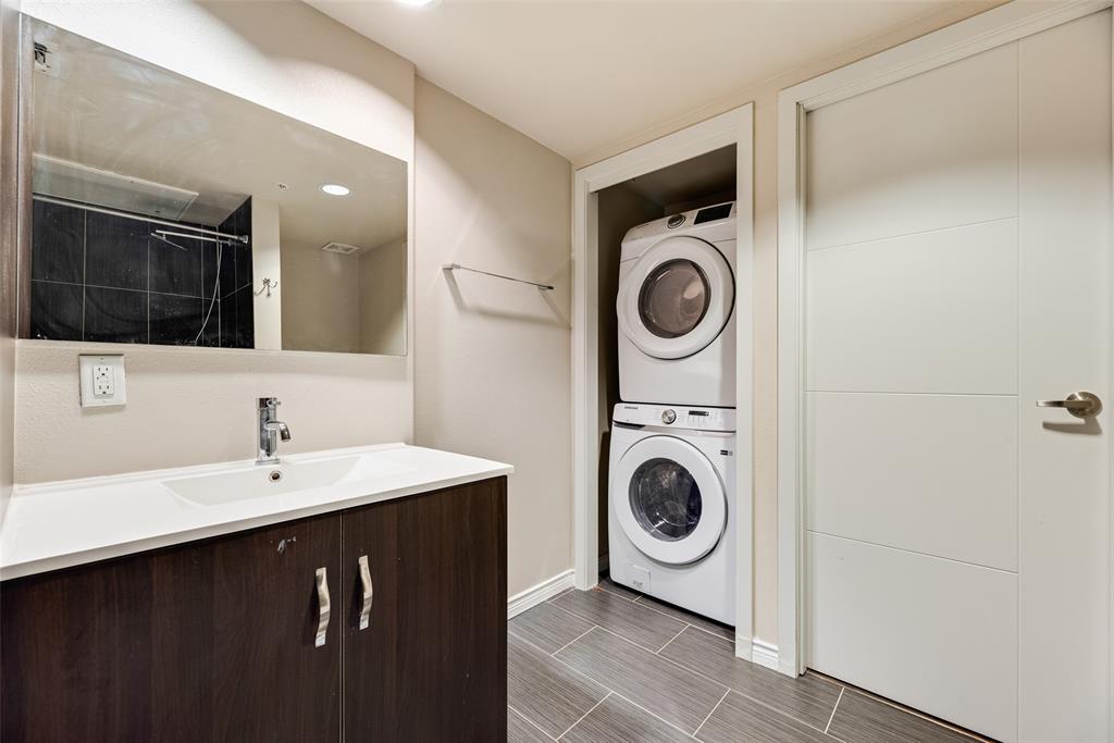 1100 West Trinity Mills Road, Unit 2040 Carrollton, TX 75006 - Photo 11 of 21 a utility room with sink dryer and washer