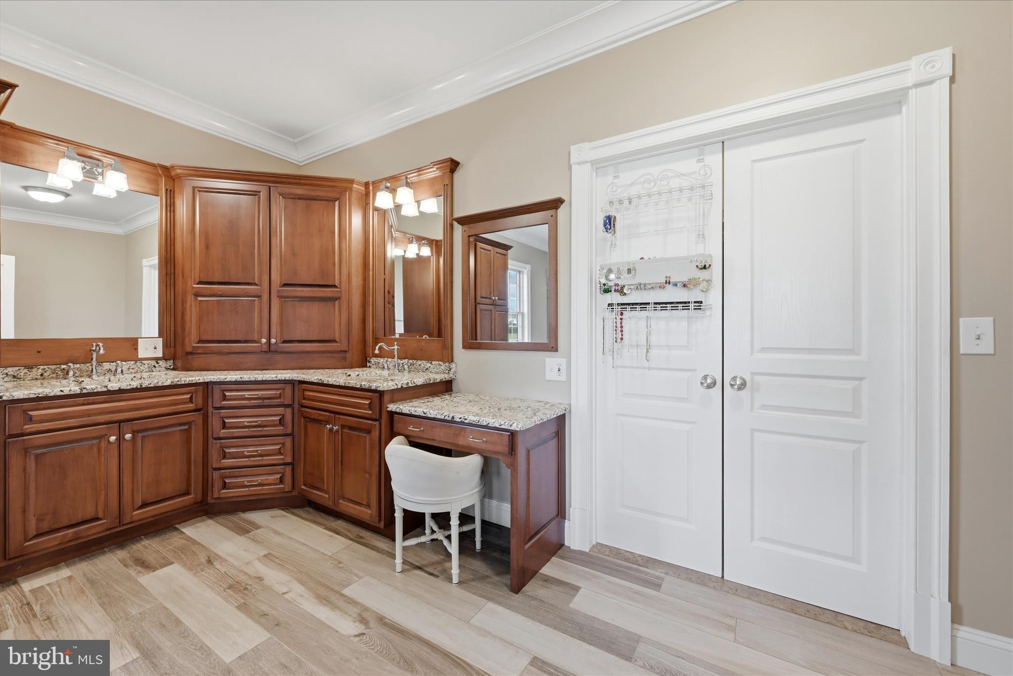 2230 Jones Road Winchester, VA 22602 - Photo 27 of 83 a spacious bathroom with a granite countertop sink a toilet and a mirror