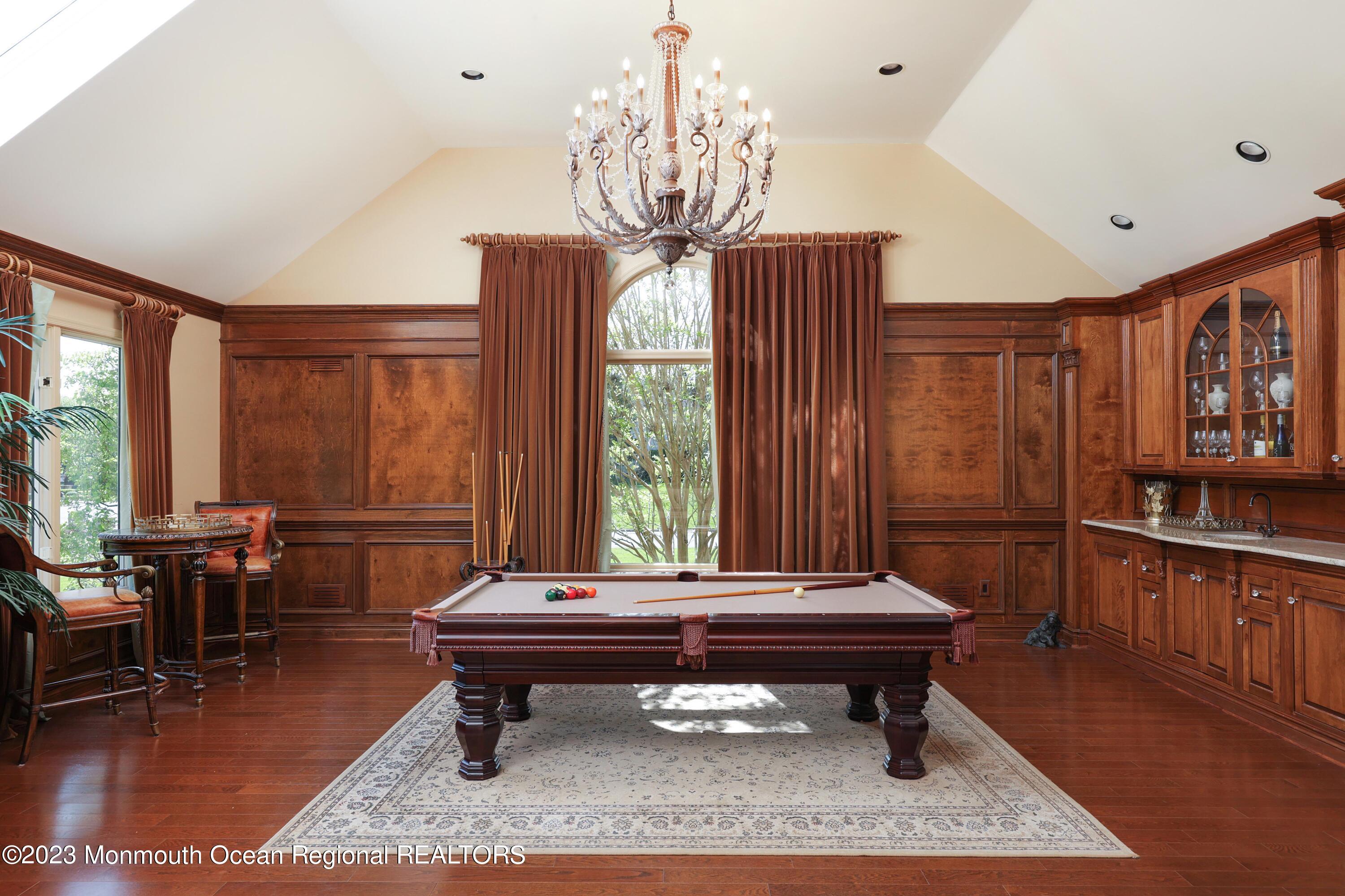 8 Old Stable Way Colts Neck, NJ 07722 - Photo 16 of 45 a living room with furniture and a large window