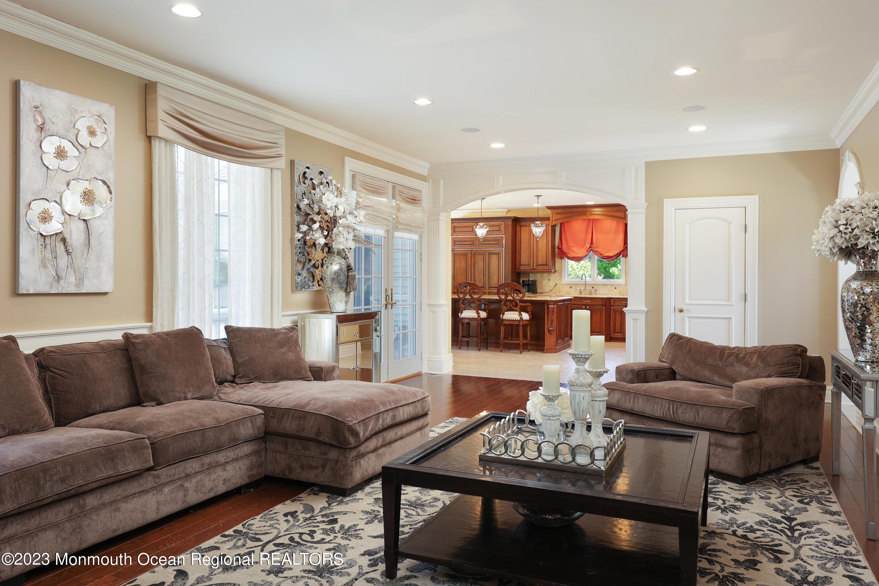 8 Old Stable Way Colts Neck, NJ 07722 - Photo 17 of 45 a living room with furniture and a large window