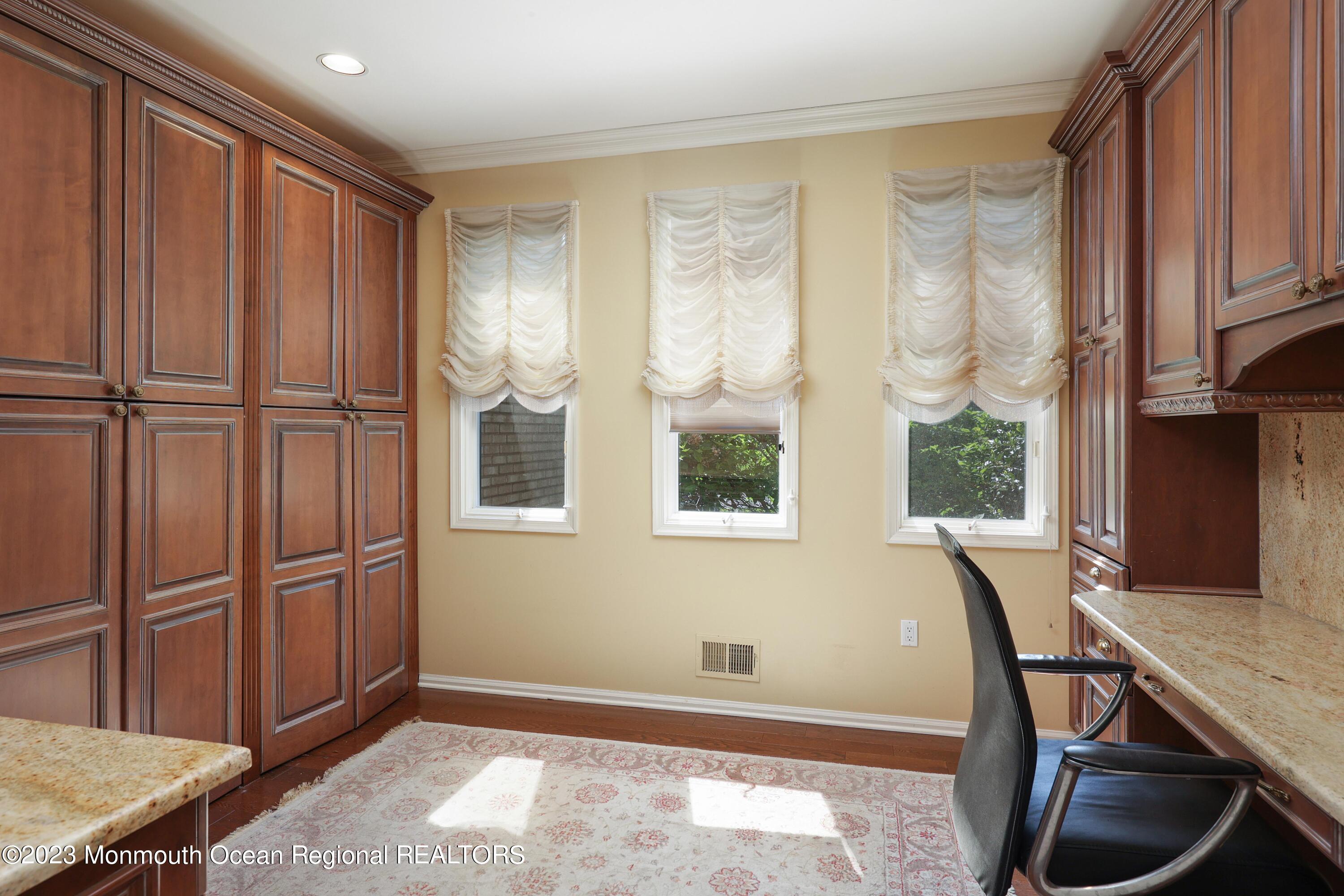 8 Old Stable Way Colts Neck, NJ 07722 - Photo 19 of 45 a view of a livingroom with furniture and window