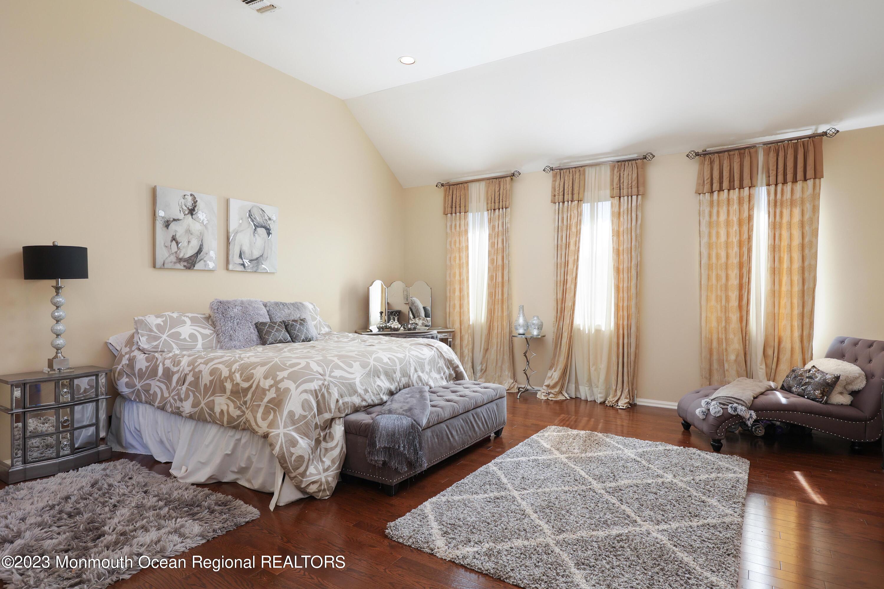 8 Old Stable Way Colts Neck, NJ 07722 - Photo 21 of 45 a bedroom with double bed and a window