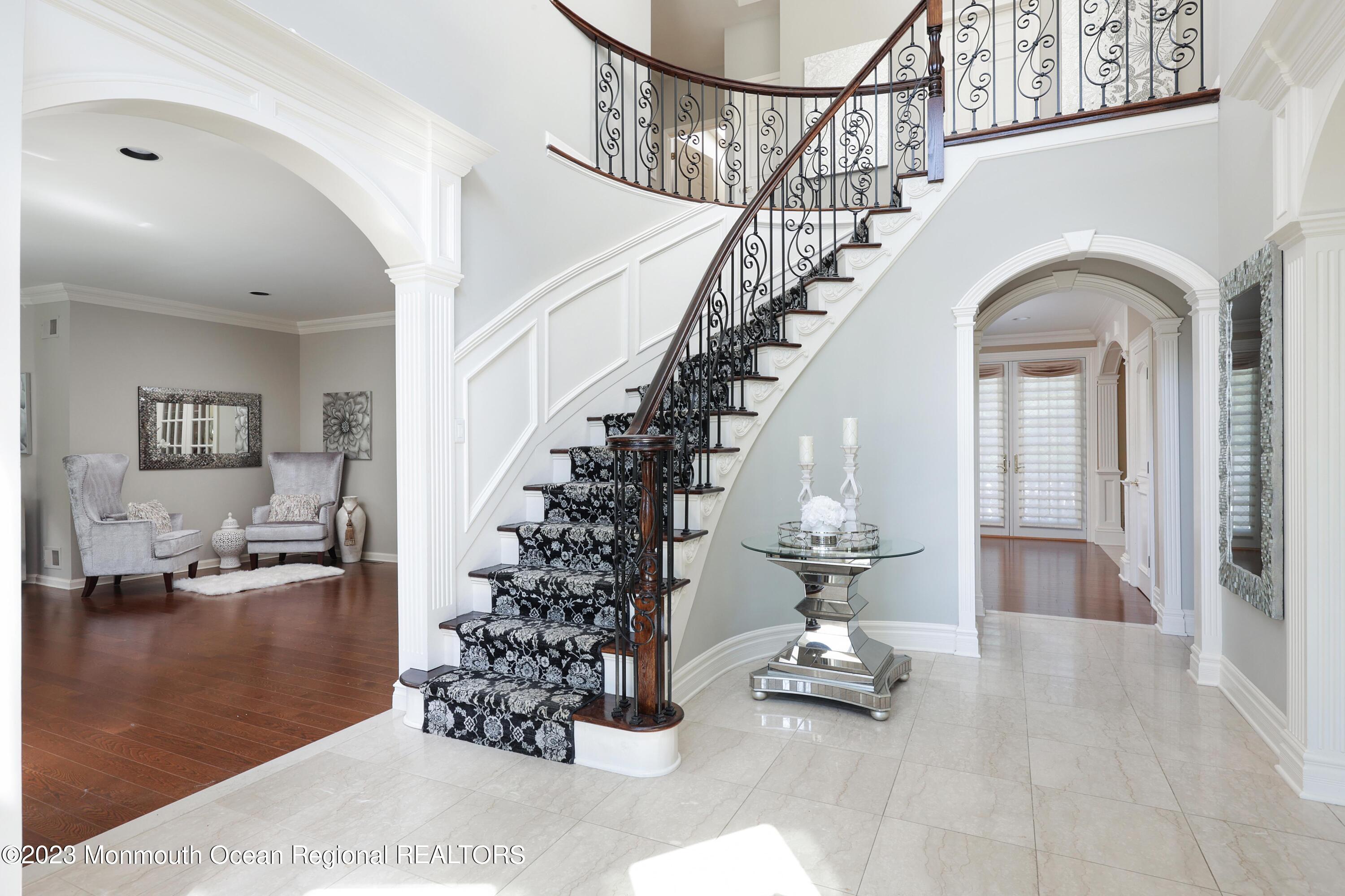 8 Old Stable Way Colts Neck, NJ 07722 - Photo 5 of 45 a view of entryway and hall with wooden floor