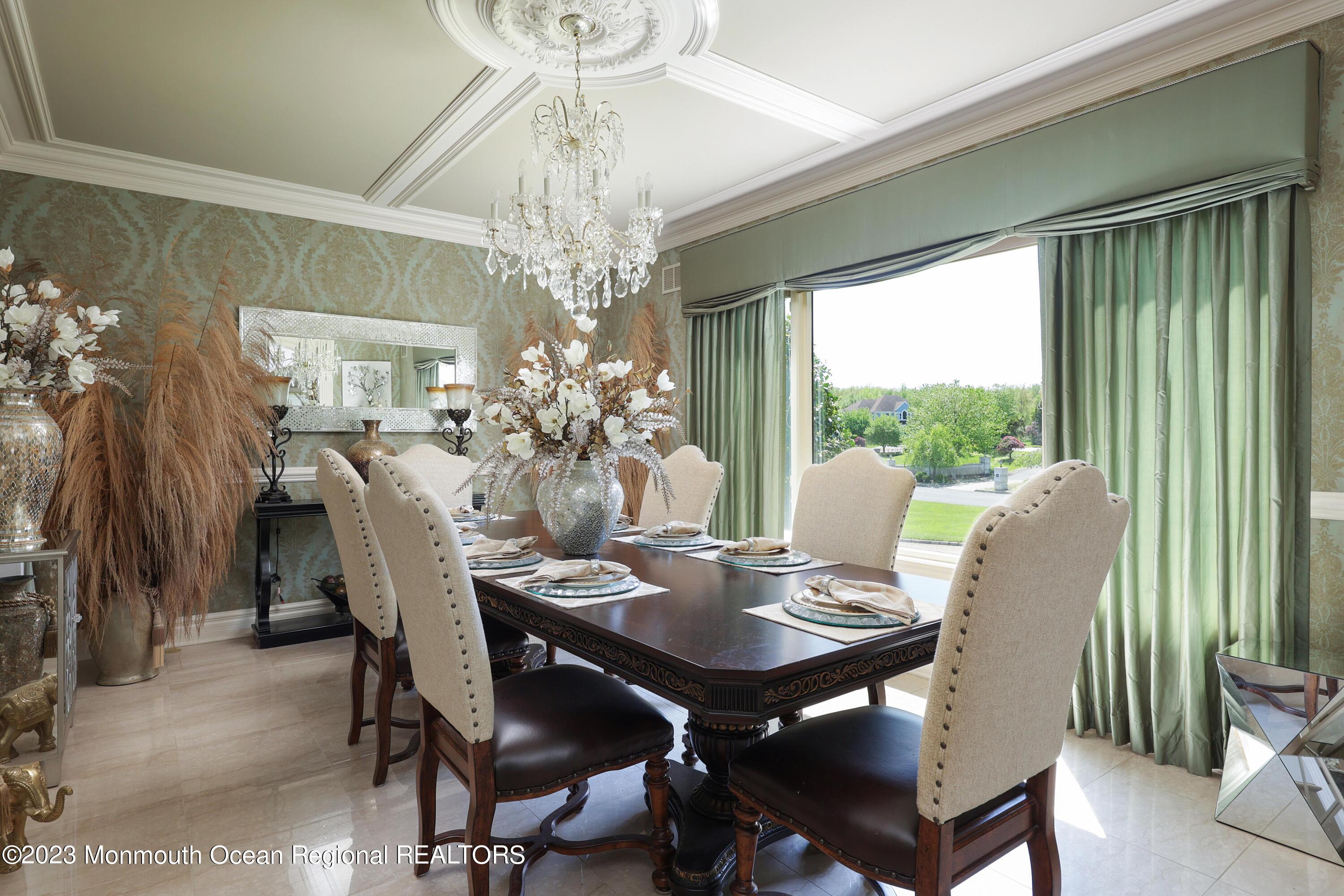 8 Old Stable Way Colts Neck, NJ 07722 - Photo 10 of 45 a view of a dining room with furniture window and outside view