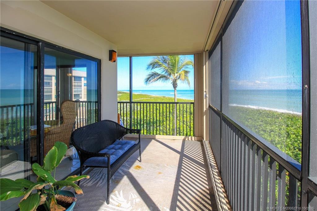 2571 Northeast Ocean Boulevard, Unit 10203 Stuart, FL 34996 - Photo 9 of 46 a view of balcony with furniture