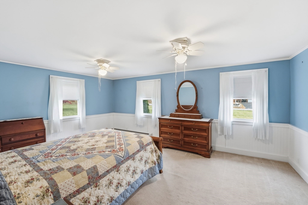 58 Colburn Road Charlton, MA 01507 - Photo 12 of 34 a bedroom with a bed and a dresser