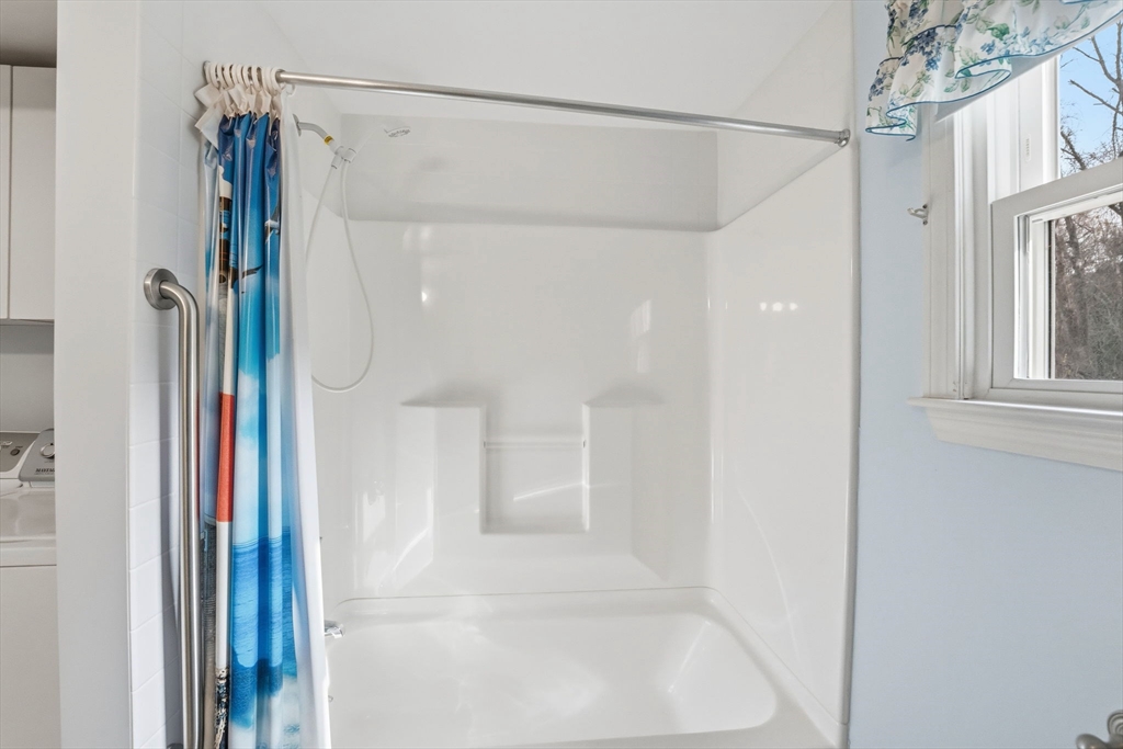 58 Colburn Road Charlton, MA 01507 - Photo 16 of 34 a bathroom with a glass shower door