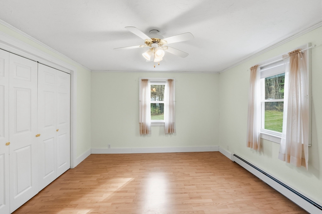58 Colburn Road Charlton, MA 01507 - Photo 20 of 34 wooden floor in an empty room with a window