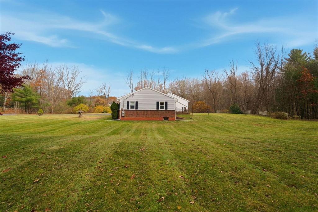 58 Colburn Road Charlton, MA 01507 - Photo 27 of 34 a view of a back yard of the house