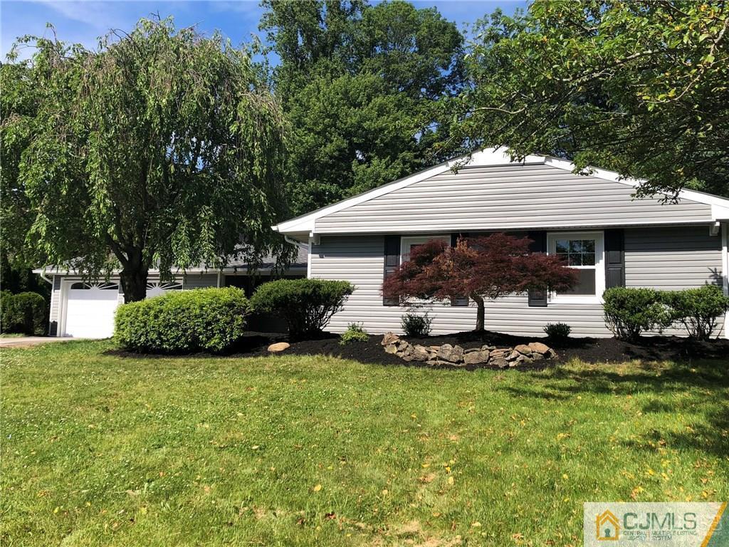 9 Edgewood Road Old Bridge, NJ 07747 - Photo 2 of 35 a view of a house with backyard sitting area and garden