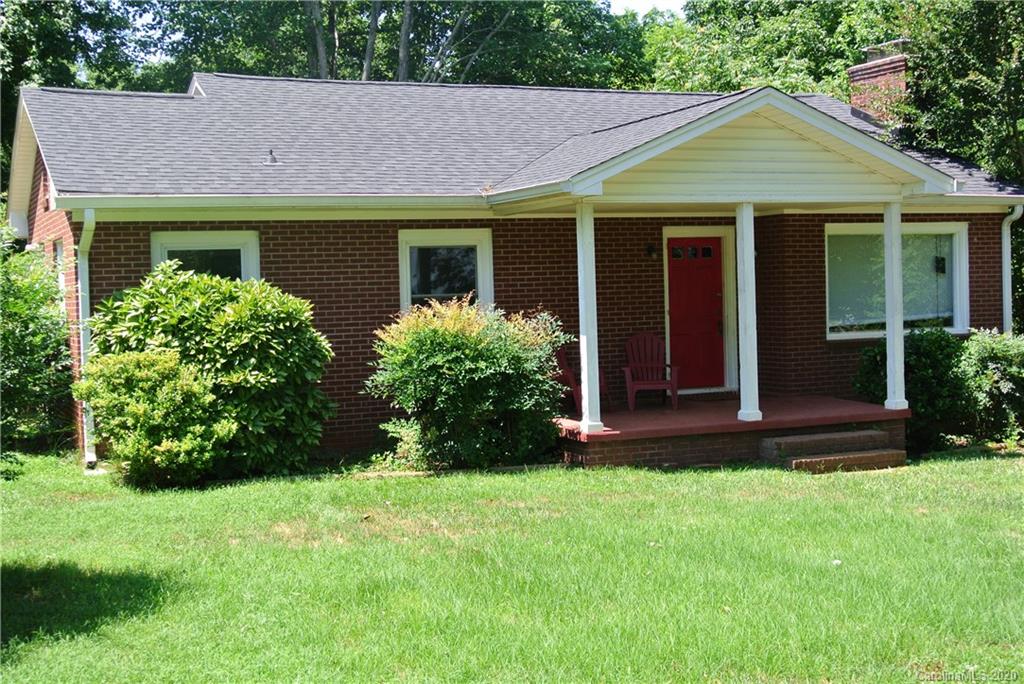 553 Chimney Rock Road Rutherfordton, NC 28139 - Photo 1 of 12 front view of a house with a yard