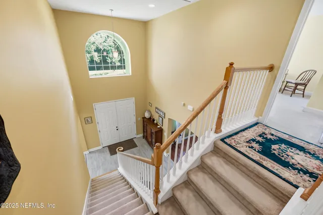 a living room with lots of furniture and window
