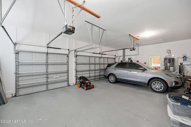 a view of a swimming pool with a yard