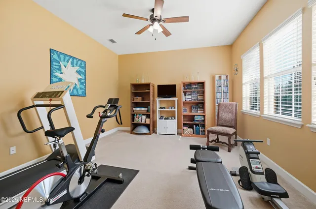 a view of a room with gym equipment