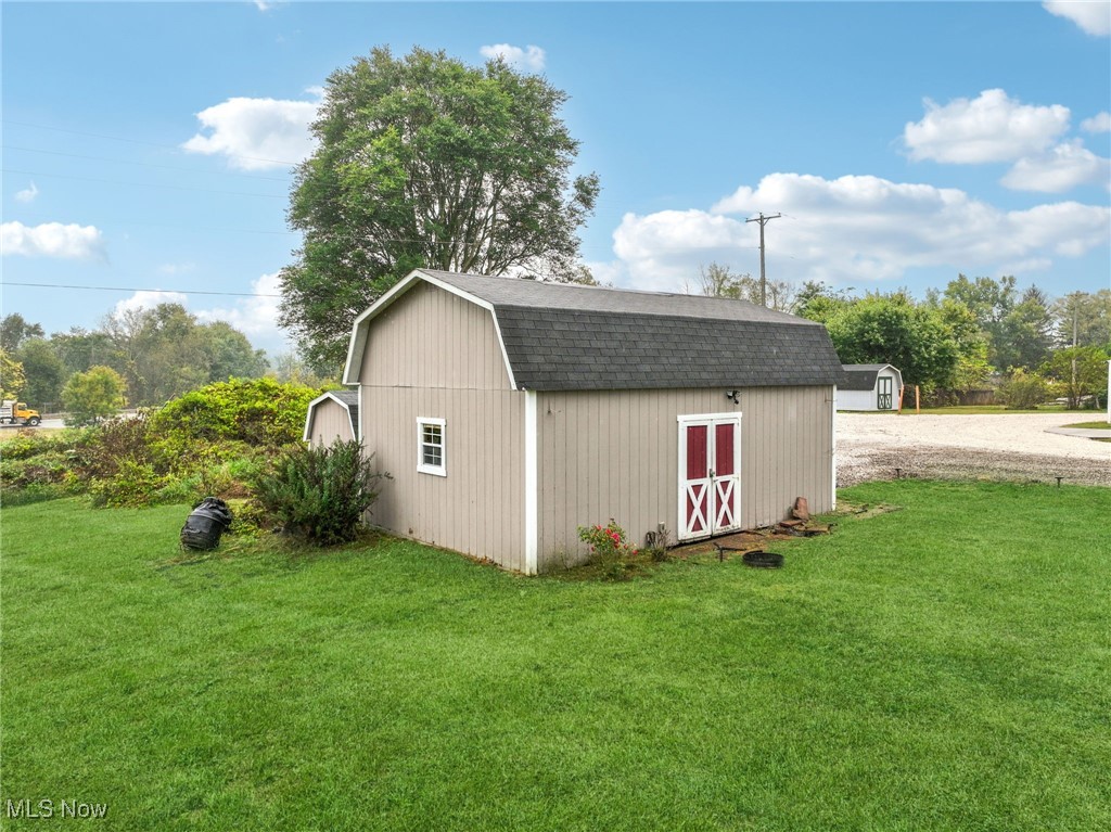 12422 Portage Street Rittman, OH 44270 - Photo 33 of 42 View of shed featuring view of scattered trees