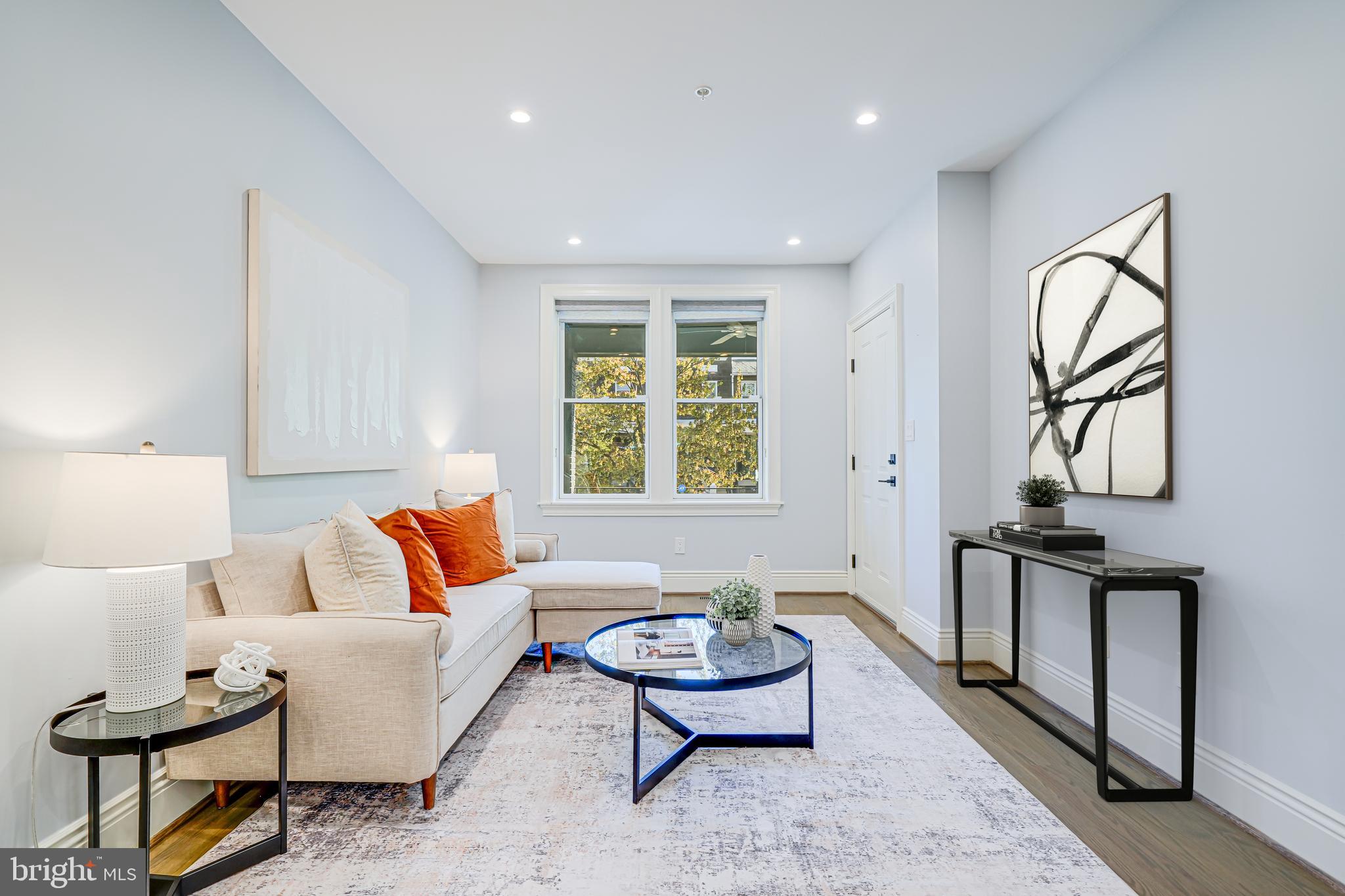 1728 D Street Southeast, Unit 1 Washington, DC 20003 - Photo 6 of 36 South-facing family room with tons of light