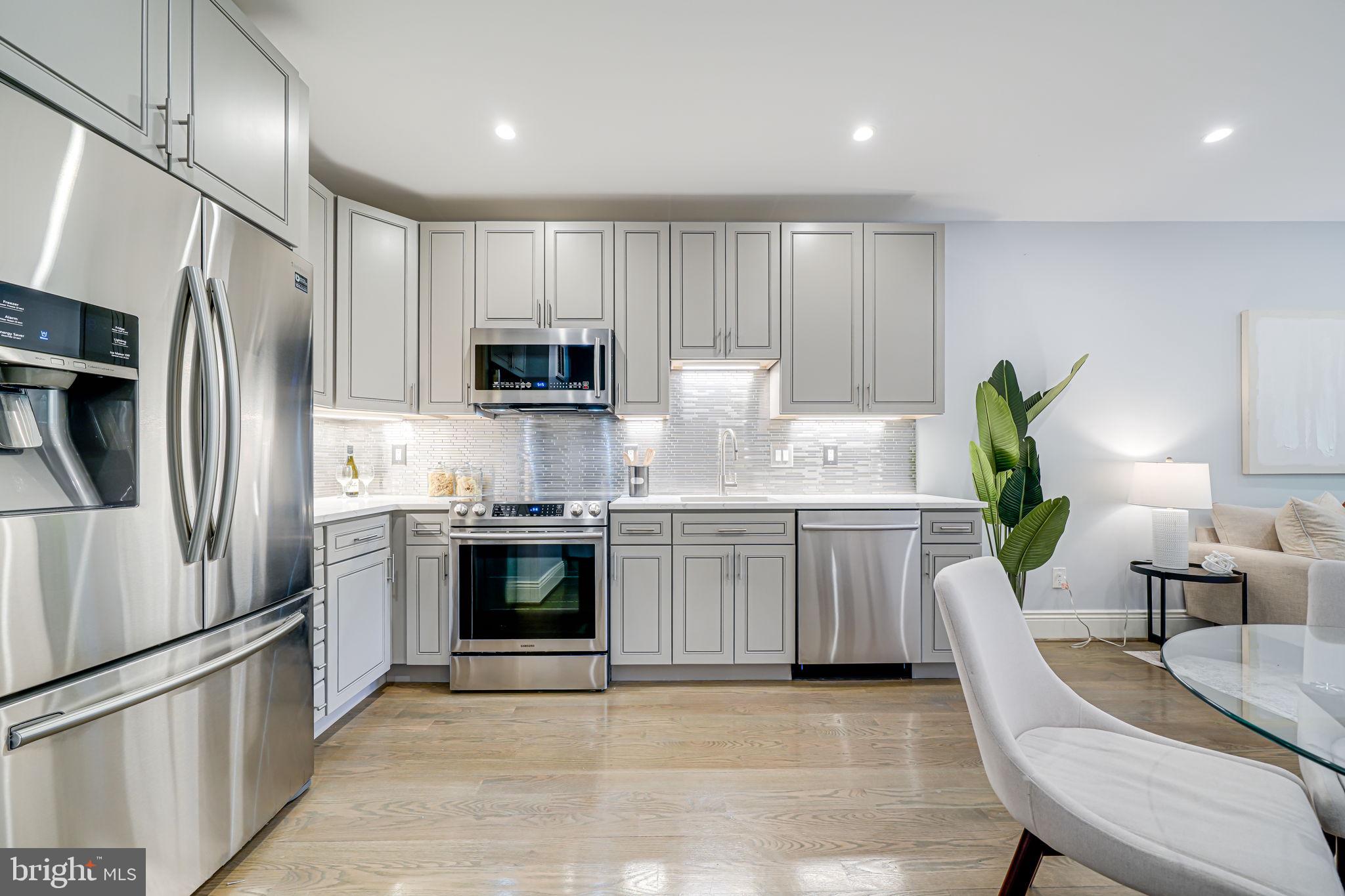 1728 D Street Southeast, Unit 1 Washington, DC 20003 - Photo 9 of 36 Modern & contemporary kitchen with SS appliances