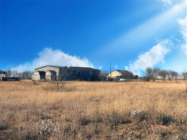 a view of a lake with sunset