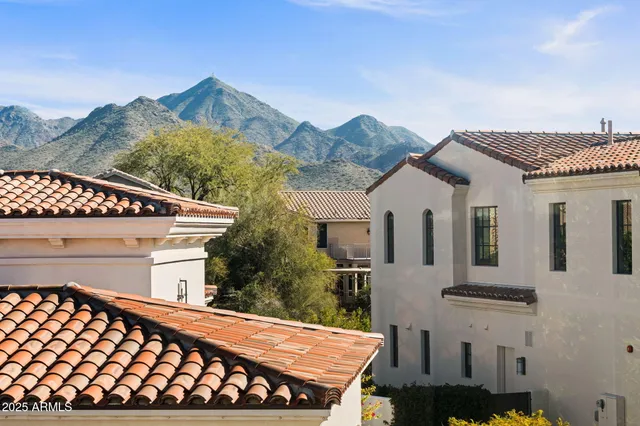 a view of a house with roof deck