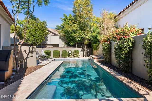 a view of a house with swimming pool